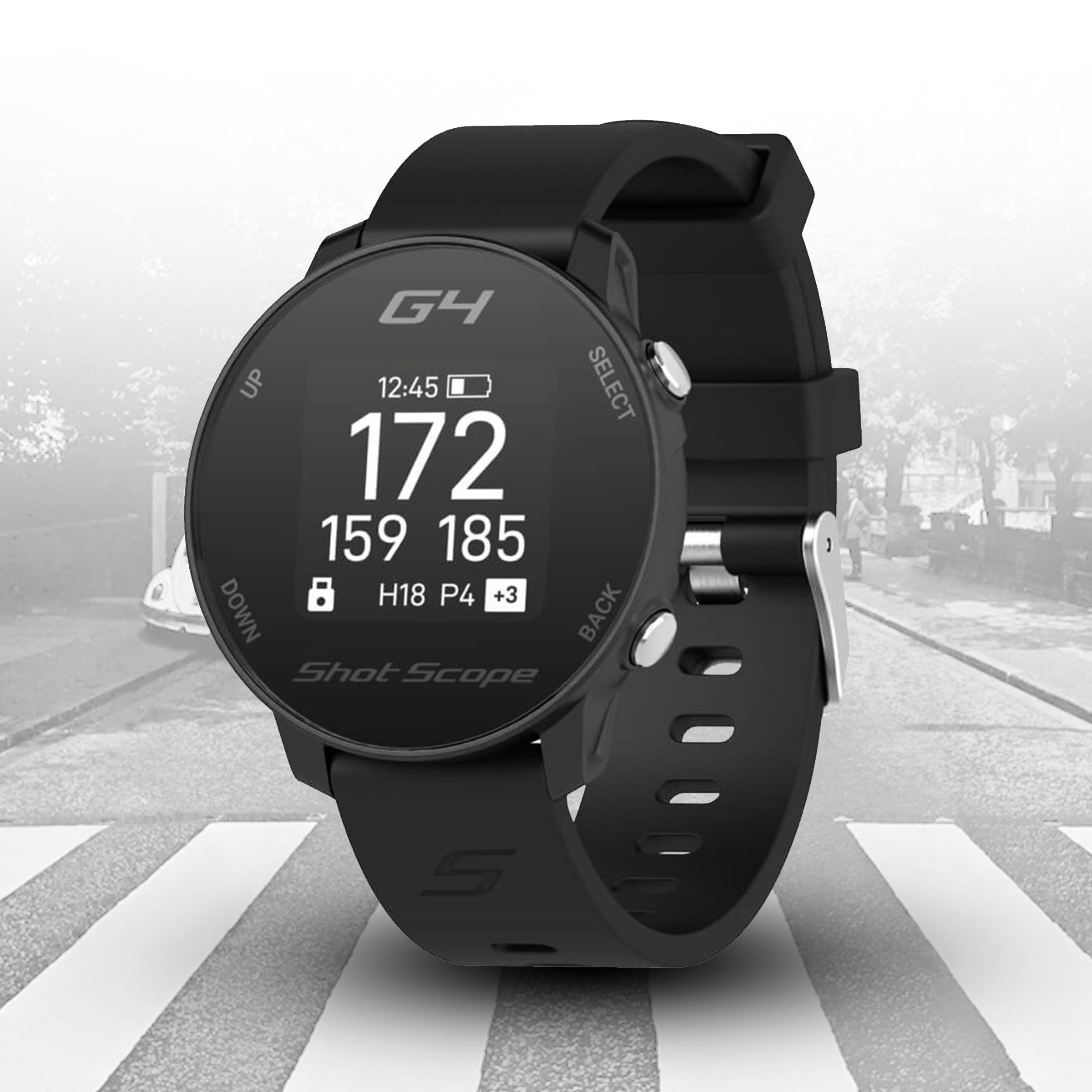 Black golf watch with digital display on a road background